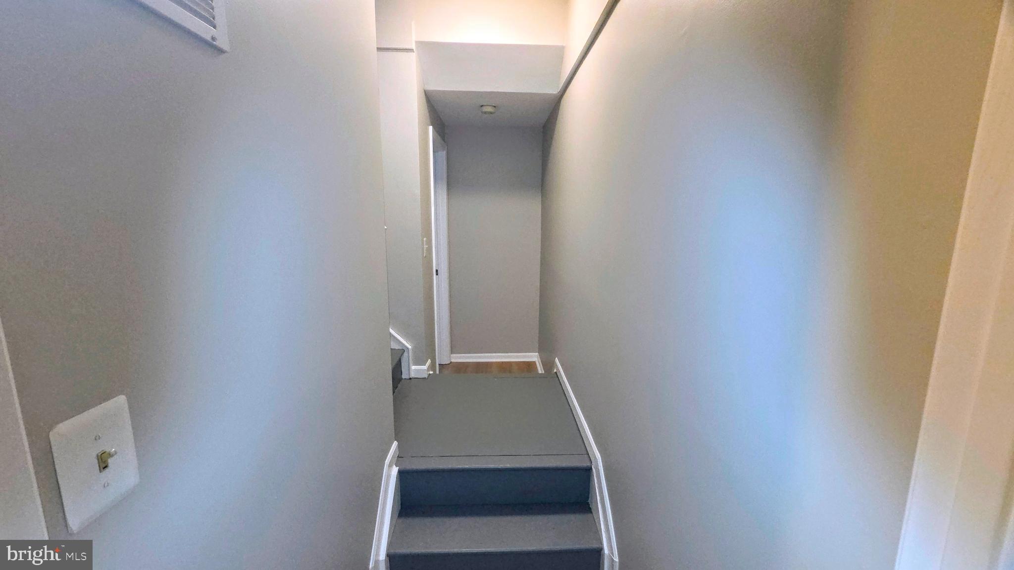 1226 East Chase Street Baltimore, MD 21202 - Photo 12 of 41 Inviting hallway leading to new possibilities.