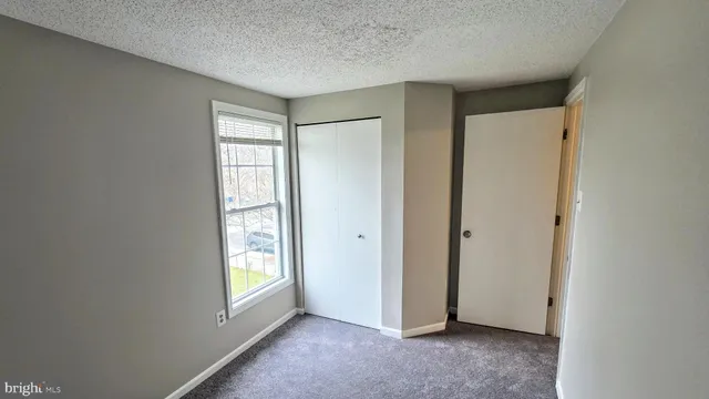 a view of an empty room with window