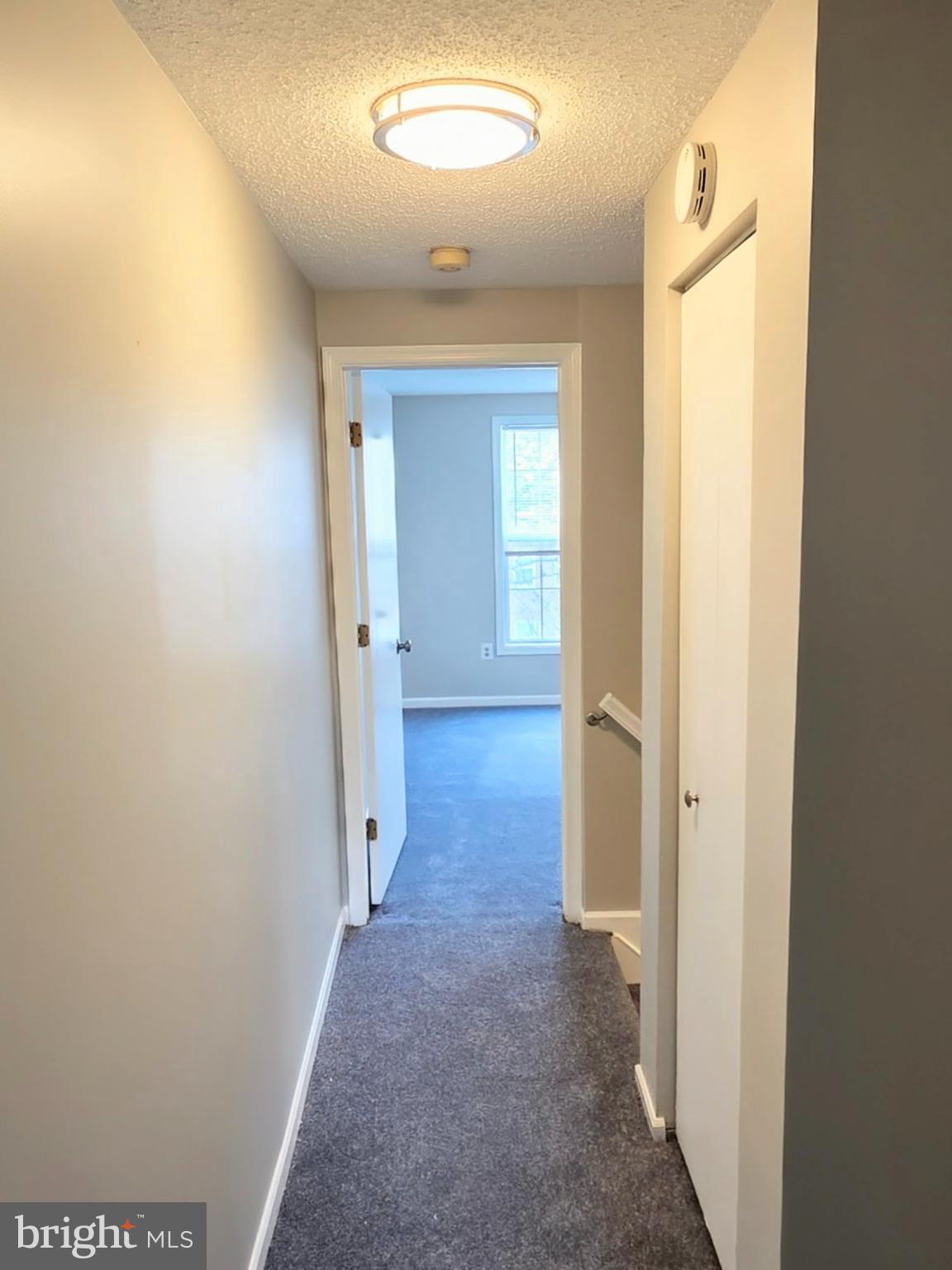1226 East Chase Street Baltimore, MD 21202 - Photo 21 of 41 Upper Level Hallway view from rear bedroom