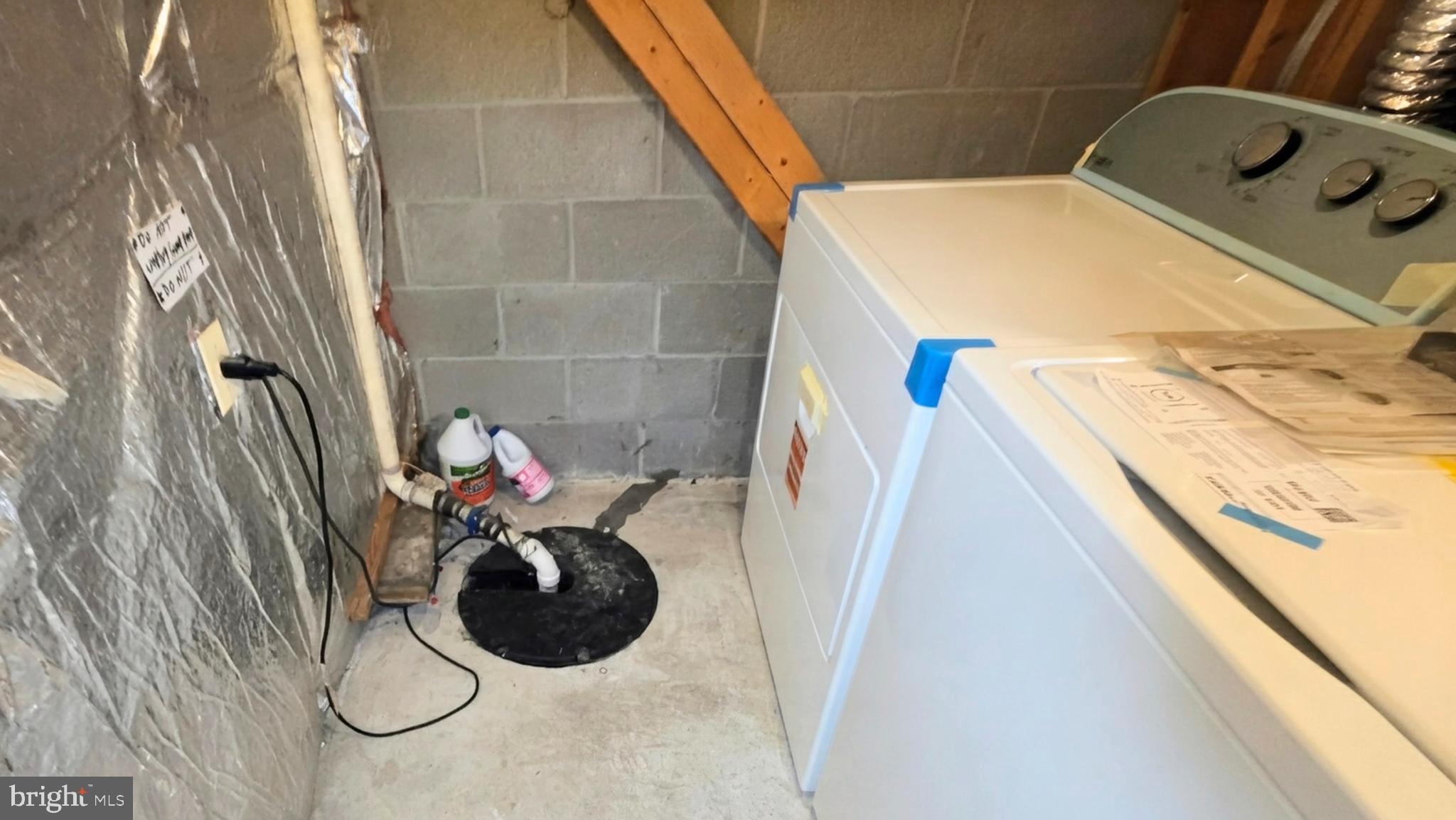 1226 East Chase Street Baltimore, MD 21202 - Photo 30 of 41 Laundry space with essential utilities.