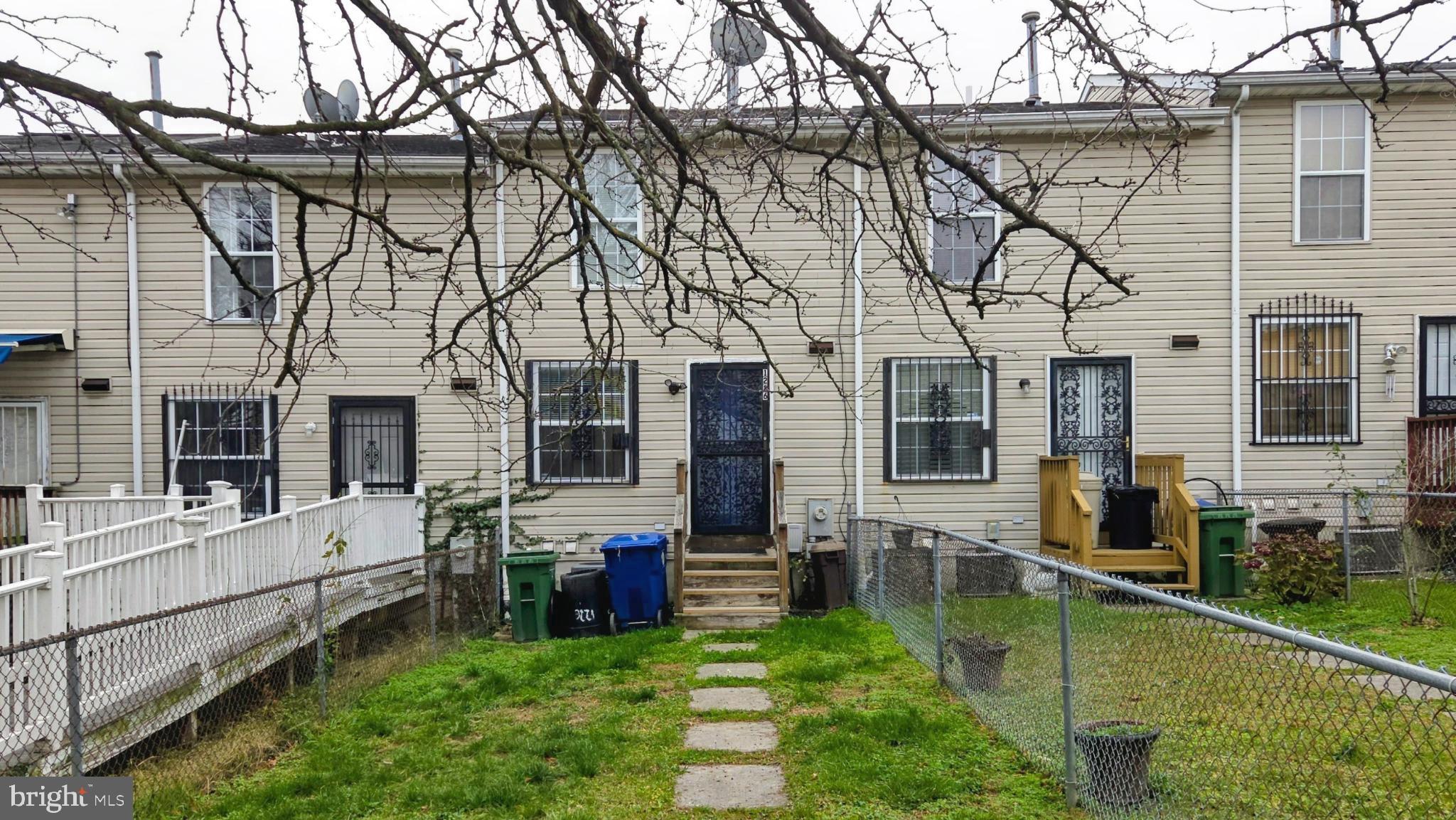1226 East Chase Street Baltimore, MD 21202 - Photo 36 of 41 Charming townhouse with inviting pathways.