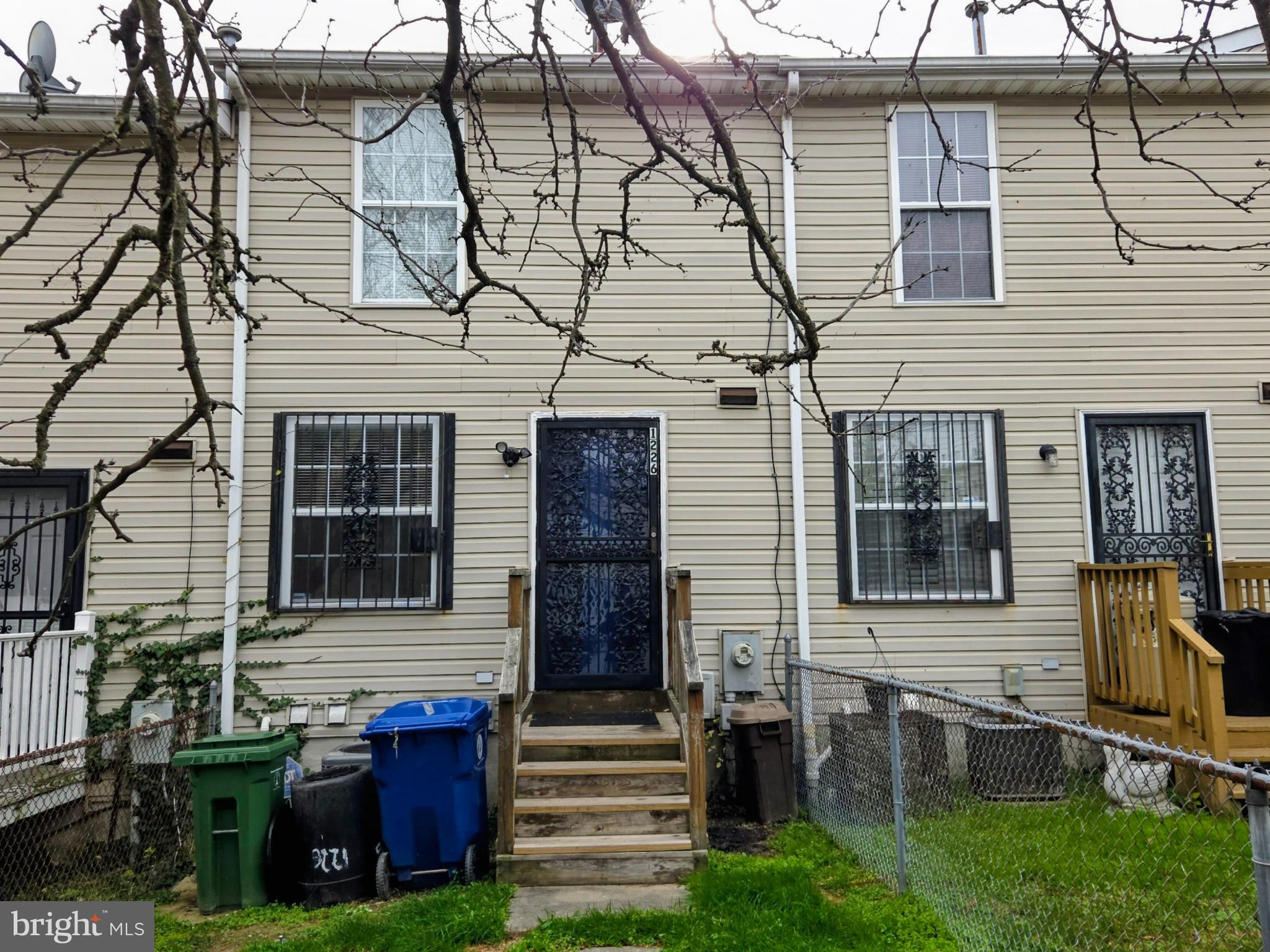 1226 East Chase Street Baltimore, MD 21202 - Photo 37 of 41 Charming townhouse with inviting entrance.