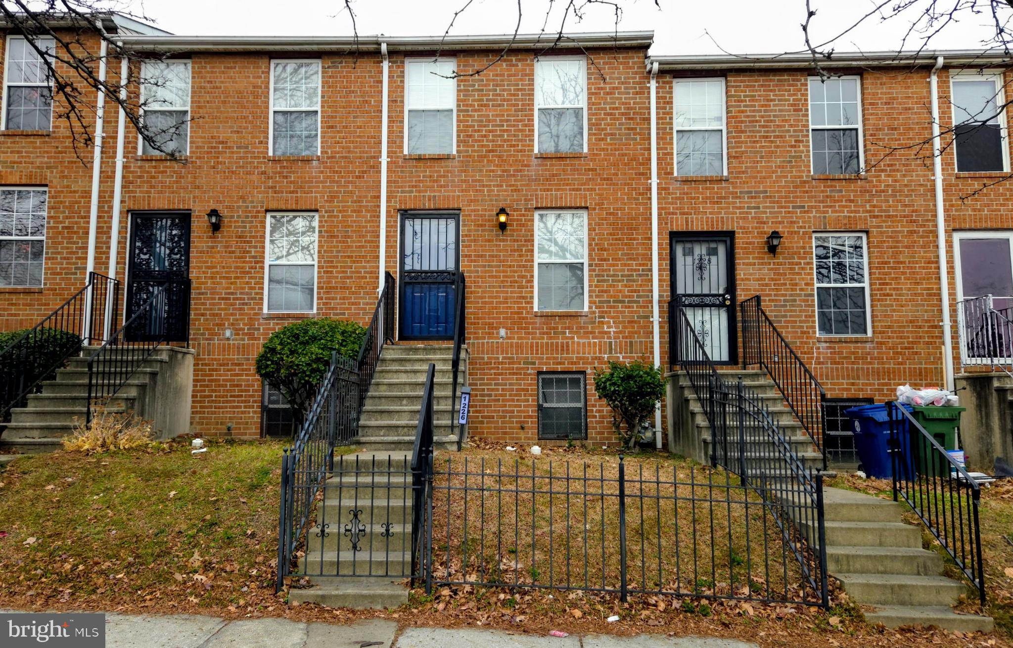 1226 East Chase Street Baltimore, MD 21202 - Photo 38 of 41 Charming brick townhomes with inviting steps.