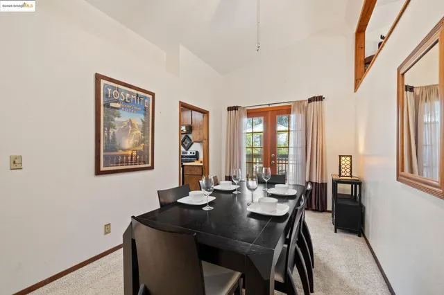 a view of a chair and table on the deck