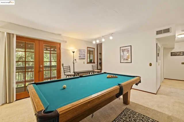 a bedroom with a mirror