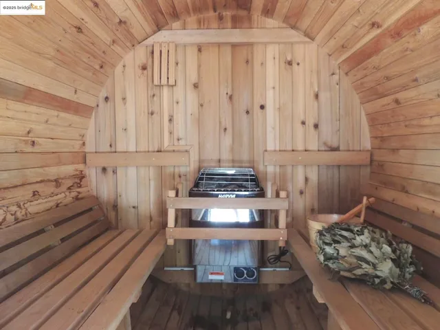 a view of a park with large trees