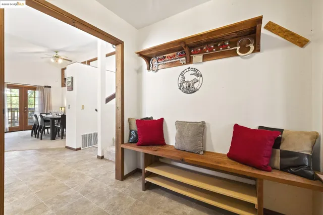 a view of a dining room with furniture window and outside view