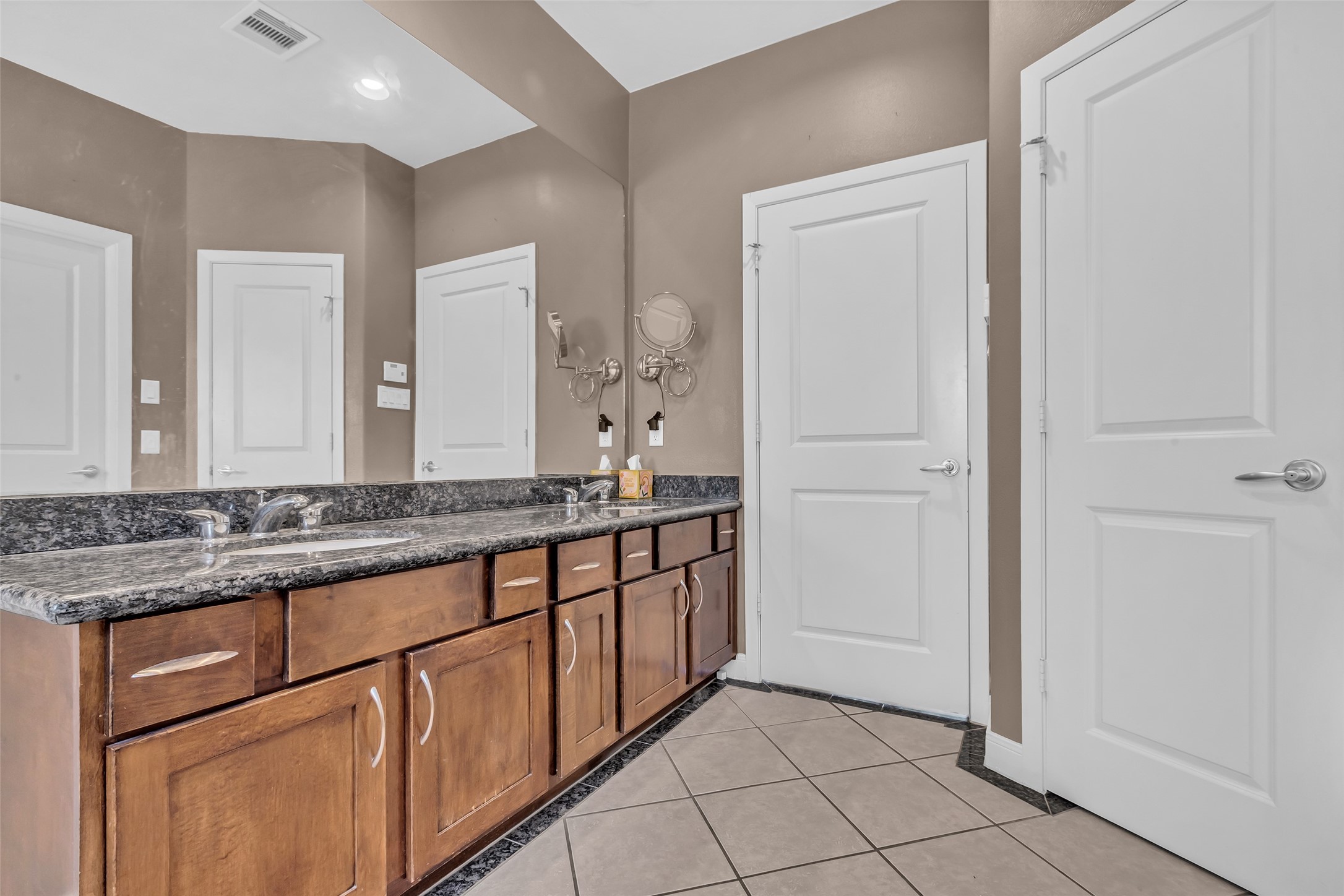 2413 Ralph Street, Unit 2 Houston, TX 77006 - Photo 14 of 26 a bathroom with a granite countertop sink and a mirror