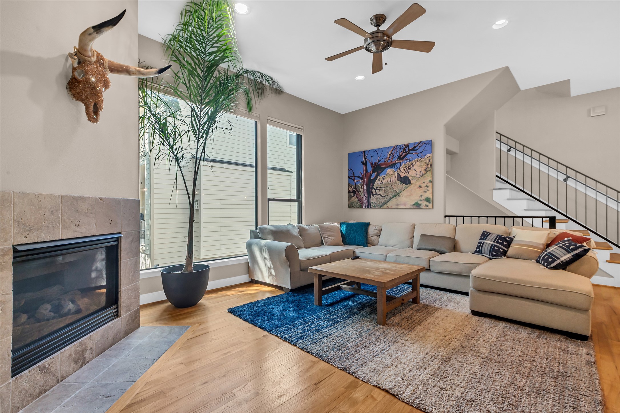 2413 Ralph Street, Unit 2 Houston, TX 77006 - Photo 4 of 26 a living room with furniture and a fireplace