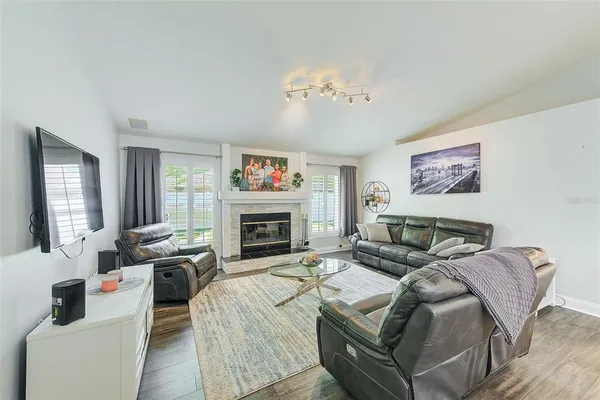 a bed room with a bed and a fireplace