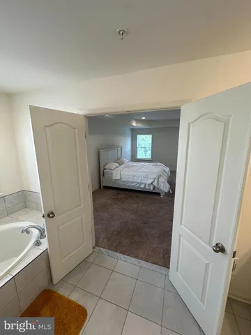 a view of workspace with a couch