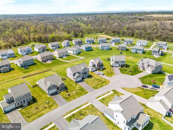 an aerial view of residential building with parking space