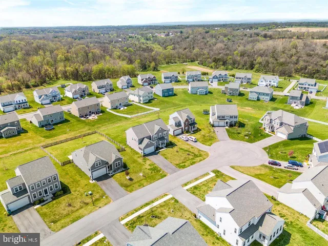 an aerial view of residential building with parking space