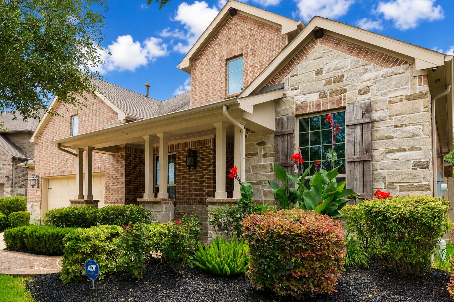 2326 Hamilton Pool Lane Friendswood, TX 77546 - Photo 1 of 49 a view of a house with potted plants