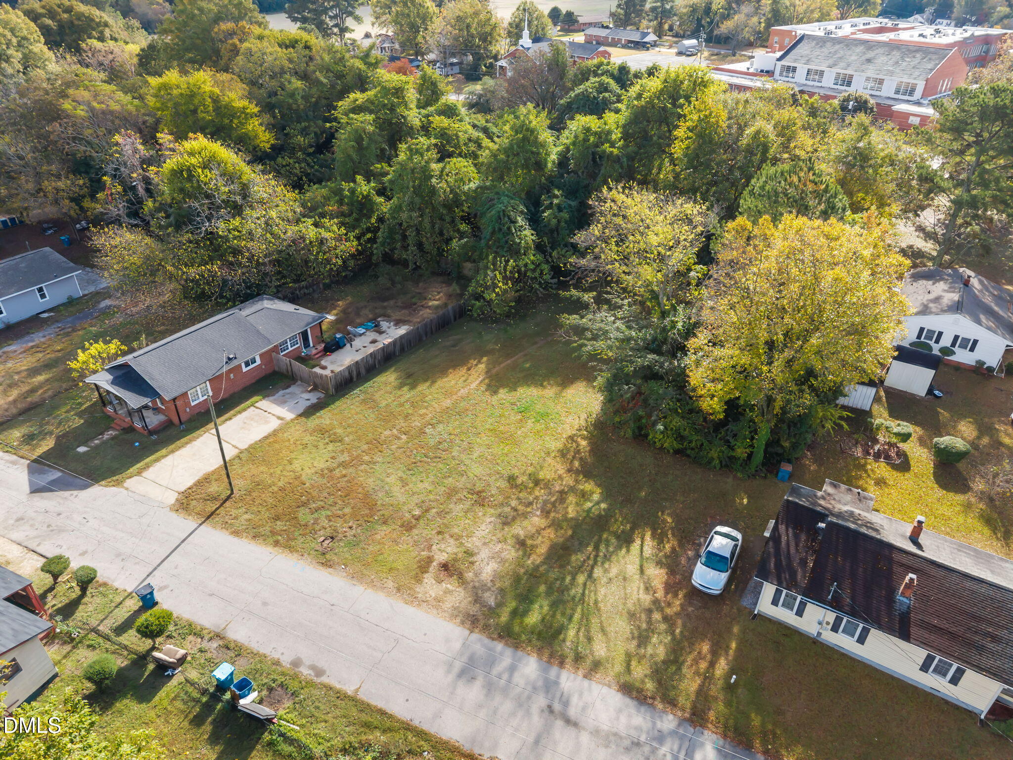 102 Jackson Street Dunn, NC 28334 - Photo 11 of 15 an aerial view of residential houses with yard