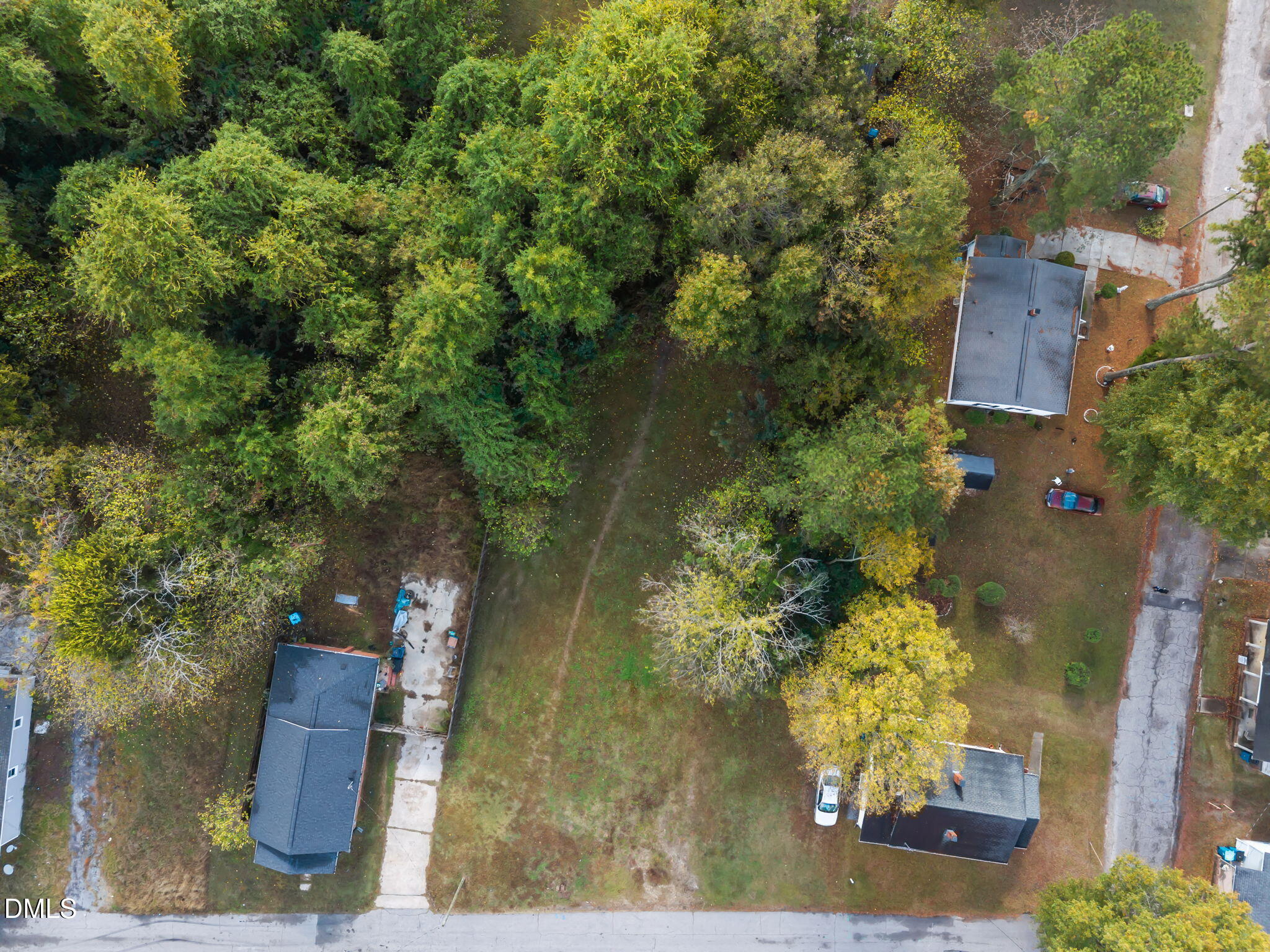 102 Jackson Street Dunn, NC 28334 - Photo 13 of 15 an aerial view of a house with a yard