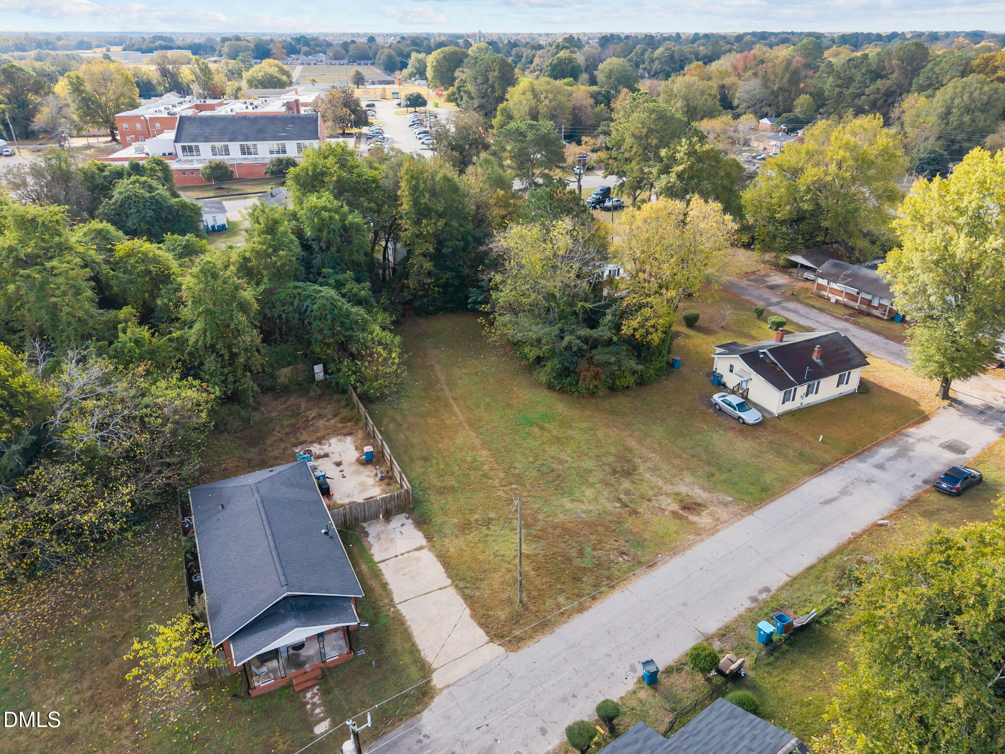 102 Jackson Street Dunn, NC 28334 - Photo 2 of 15 an aerial view of residential house with outdoor space
