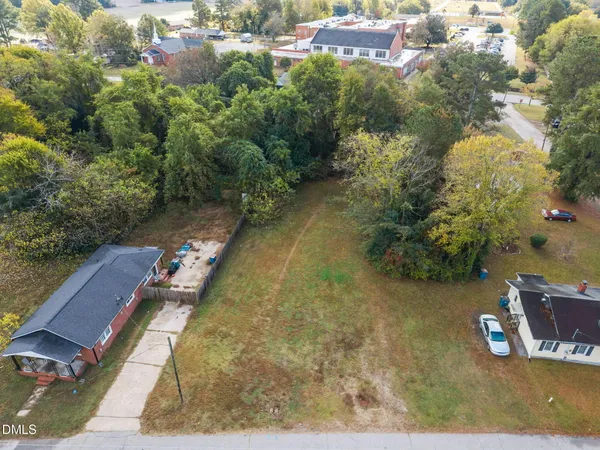 a view of a lake with a yard