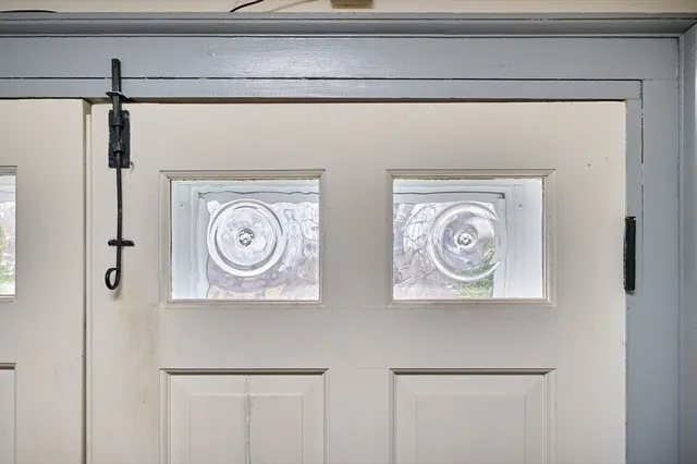a view of a refrigerator a washer and dryer
