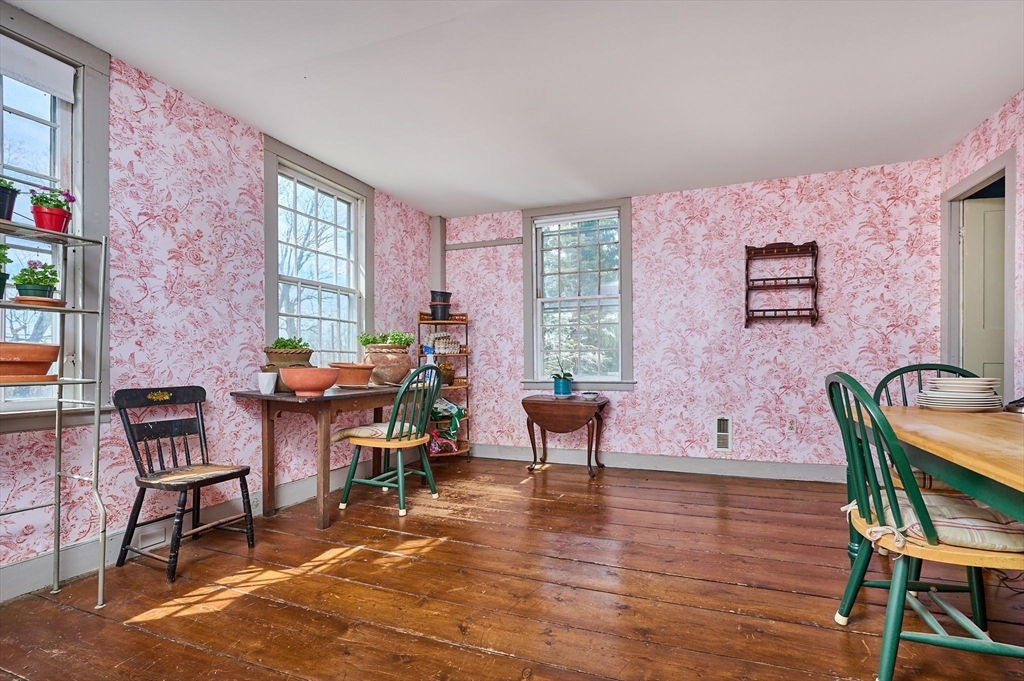 296 Main Street Plainfield, MA 01070 - Photo 27 of 42 a living room with furniture a rug and a window