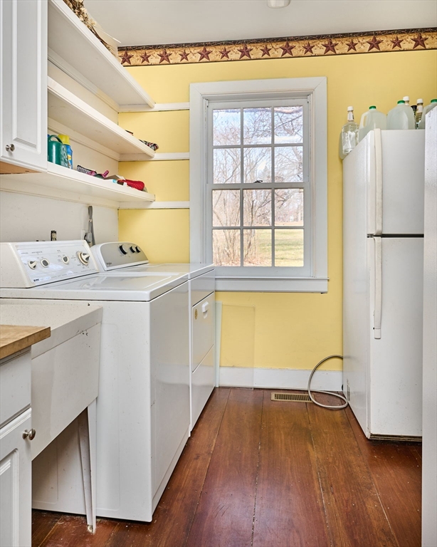 296 Main Street Plainfield, MA 01070 - Photo 6 of 42 a room with a window and wooden floors