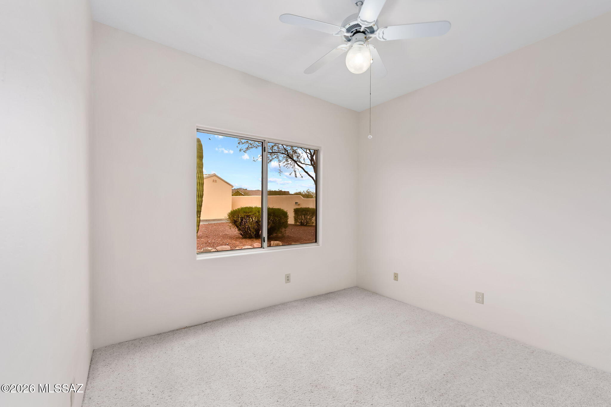 3655 North Harrison Road Tucson, AZ 85749 - Photo 30 of 51 an empty room with a window