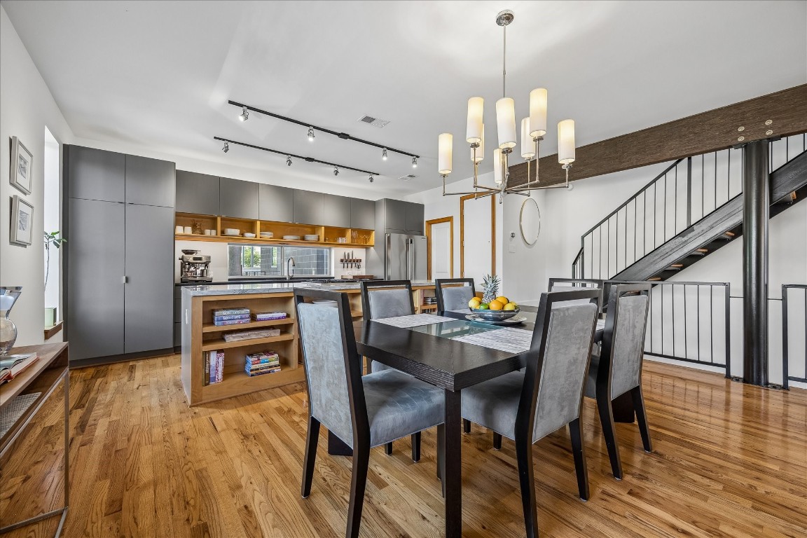 98 Drew Street, Unit A Houston, TX 77006 - Photo 19 of 38 a dining room with furniture and wooden floor
