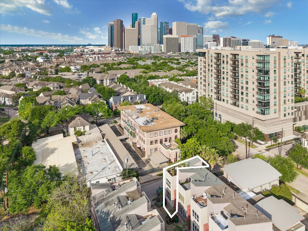 98 Drew Street, Unit A Houston, TX 77006 - Photo 2 of 38 a view of a city with tall buildings