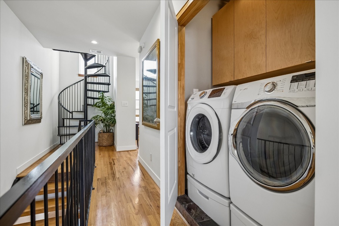 98 Drew Street, Unit A Houston, TX 77006 - Photo 34 of 38 a view of a hallway with washer and dryer