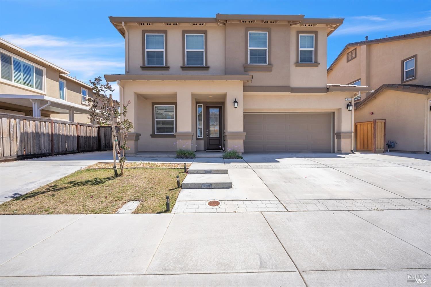 526 Epic Street Vacaville, CA 95688 - Photo 2 of 39 a front view of a house with a yard