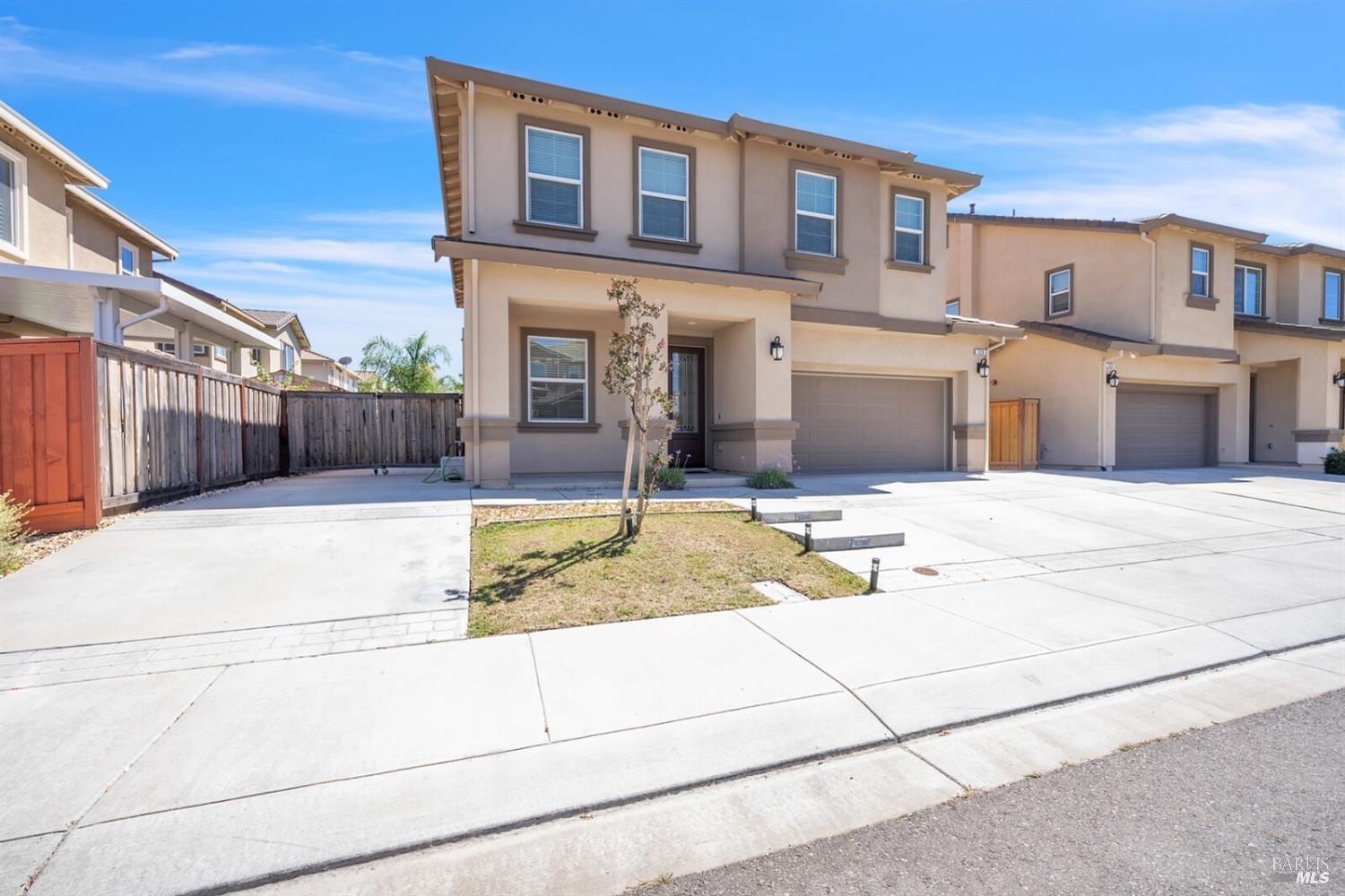 526 Epic Street Vacaville, CA 95688 - Photo 3 of 39 a view of a house with backyard and kitchen