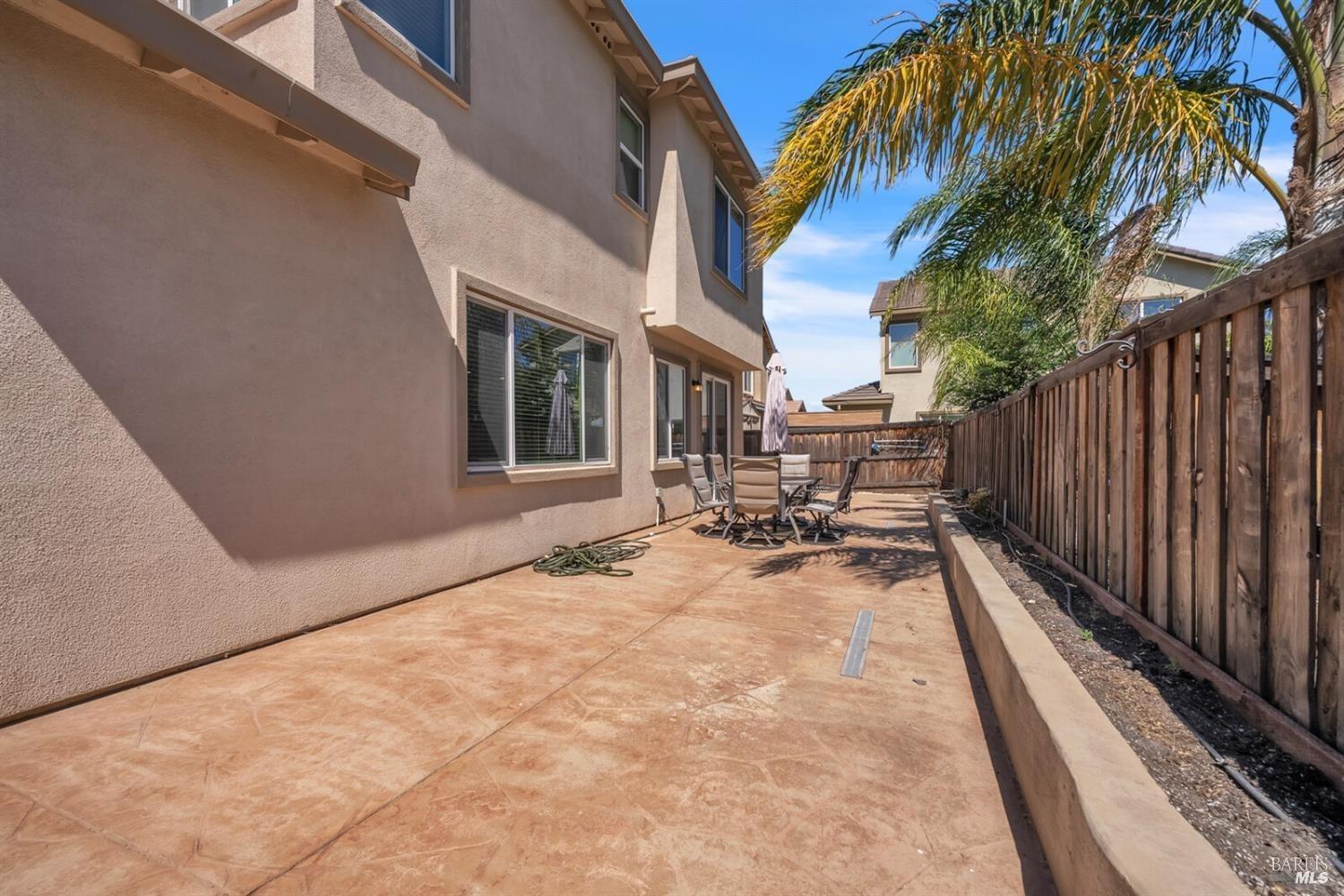 526 Epic Street Vacaville, CA 95688 - Photo 33 of 39 a view of backyard with barbeque grill and wooden fence