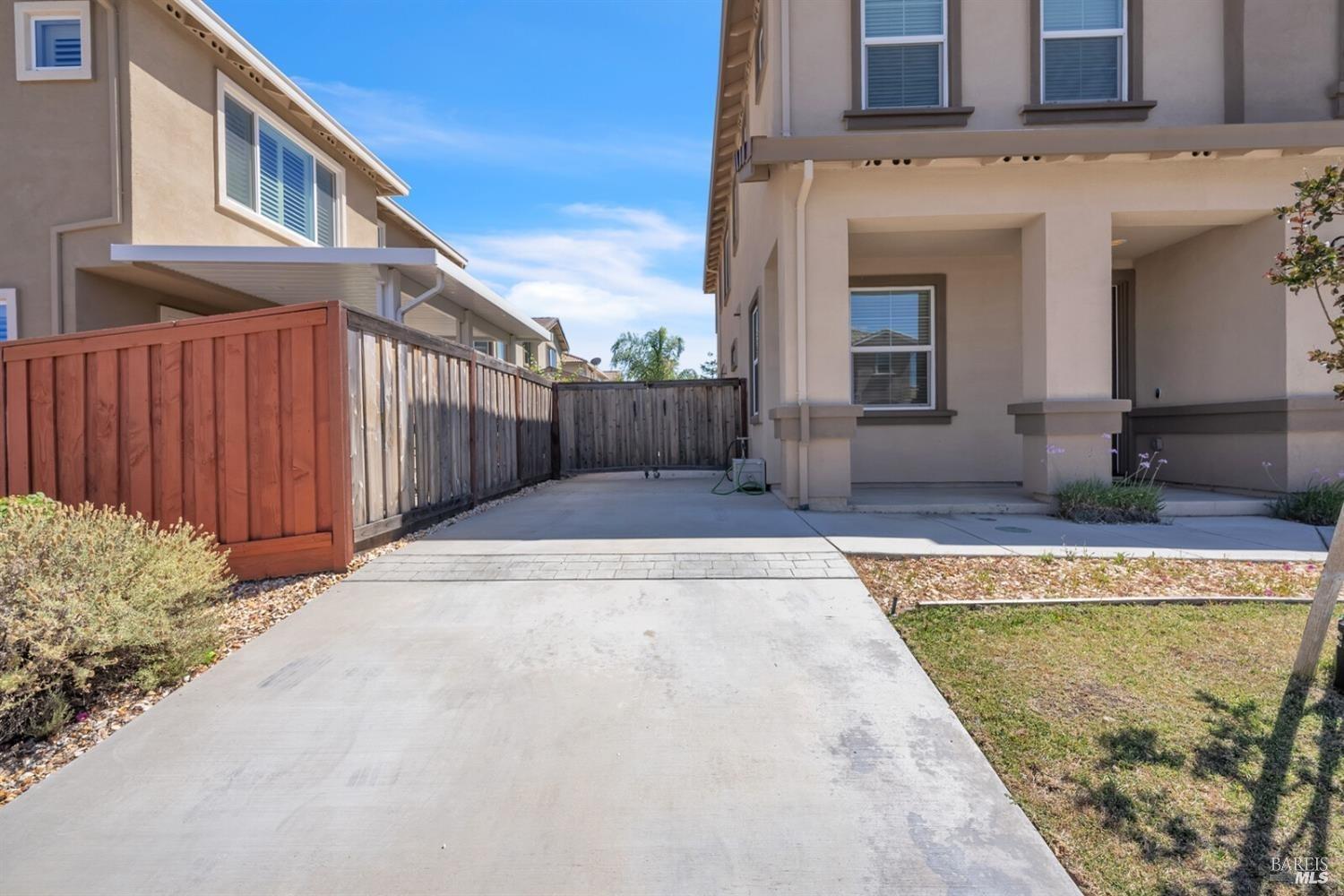 526 Epic Street Vacaville, CA 95688 - Photo 4 of 39 a view of a building with a swimming pool
