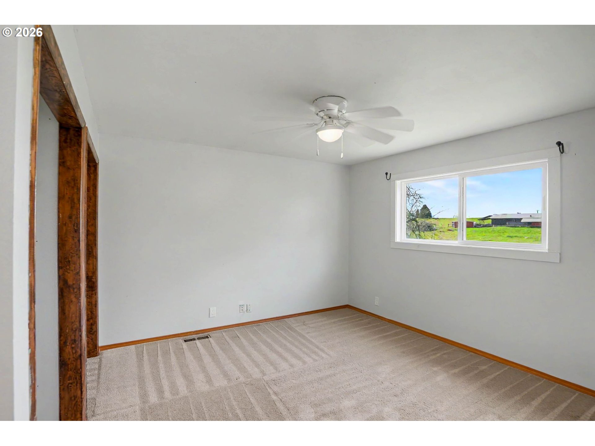 11072 South Bremer Road Canby, OR 97013 - Photo 22 of 44 a view of an empty room with a window