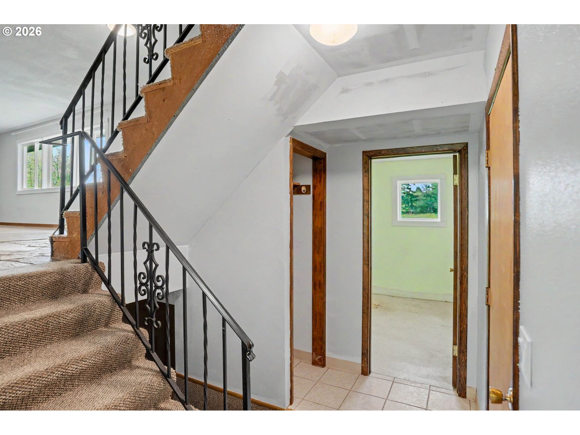 11072 South Bremer Road Canby, OR 97013 - Photo 24 of 44 a view of a hallway with wooden floor and stairs