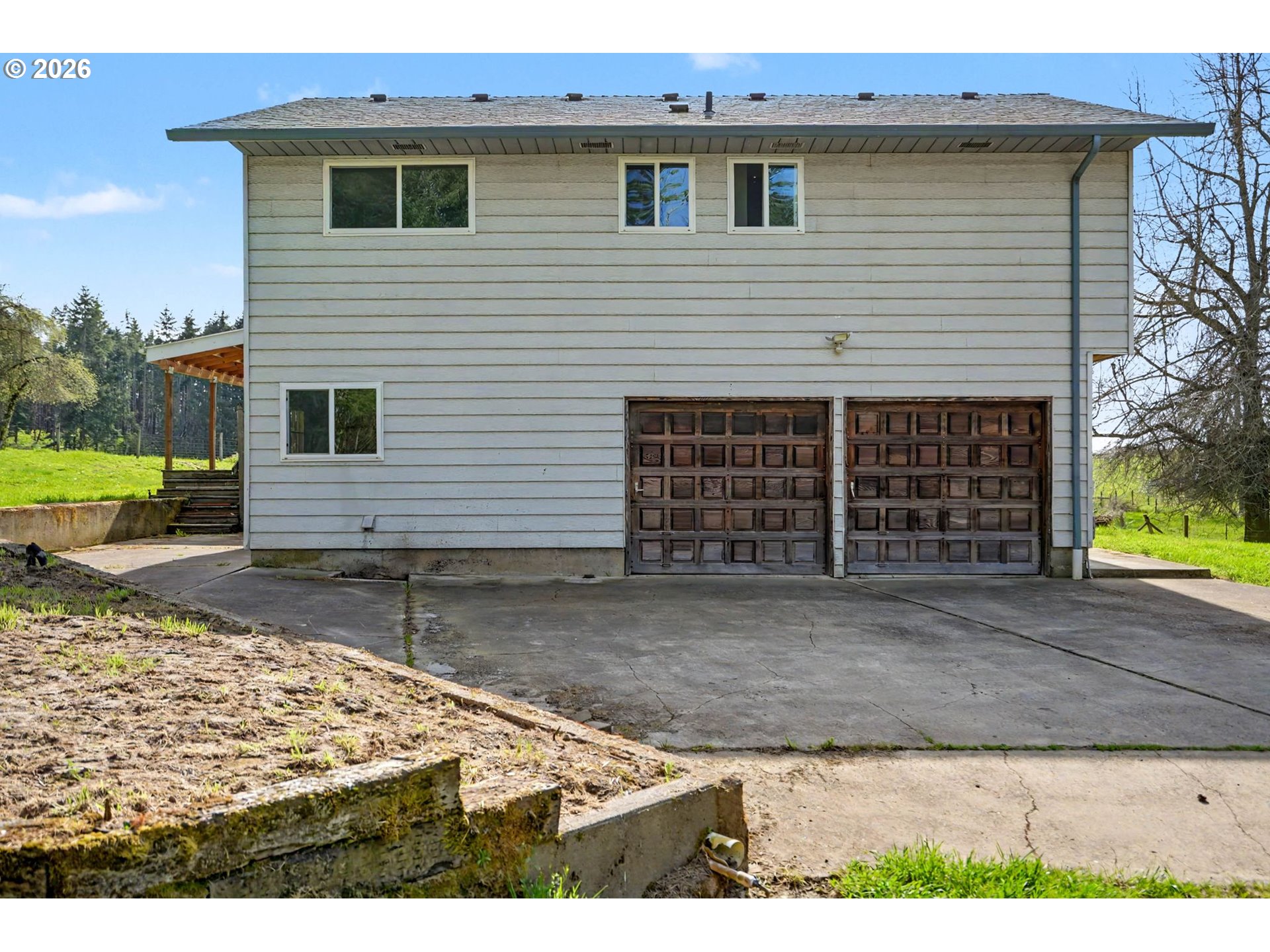 11072 South Bremer Road Canby, OR 97013 - Photo 36 of 44 a view of a house with a yard
