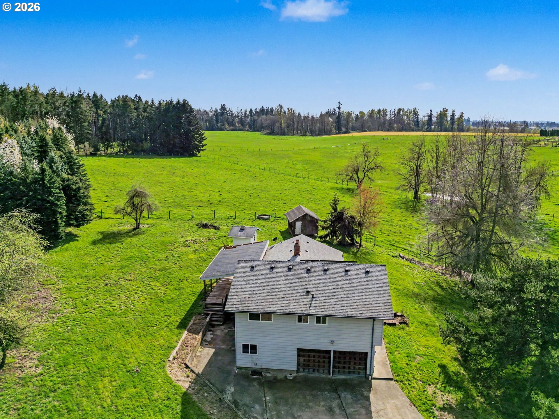 11072 South Bremer Road Canby, OR 97013 - Photo 38 of 44 a view of a lake with a yard