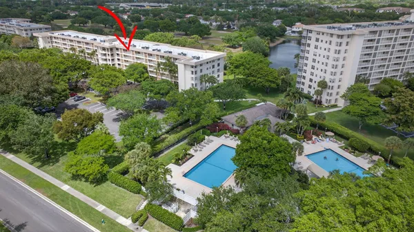 an aerial view of residential house with outdoor space