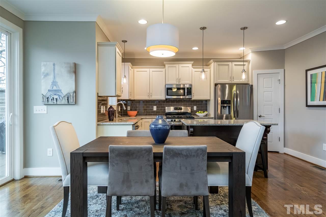 185 Pineland Circle Raleigh, NC 27606 - Photo 14 of 30 a view of a dining room with furniture
