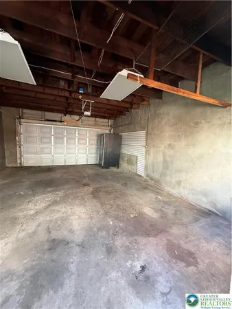 a view of a room with wooden walls
