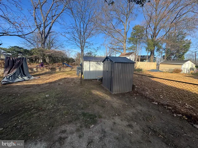 a view of a yard covered with snow in the yard