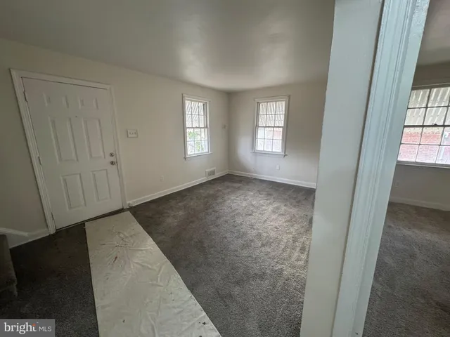 a bathroom with a shower and a bath tub