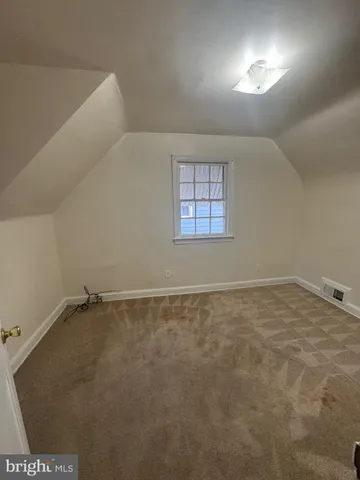 a bathroom with a toilet and a sink