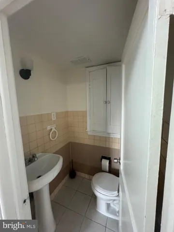 a kitchen with stainless steel appliances granite countertop a stove sink and cabinets