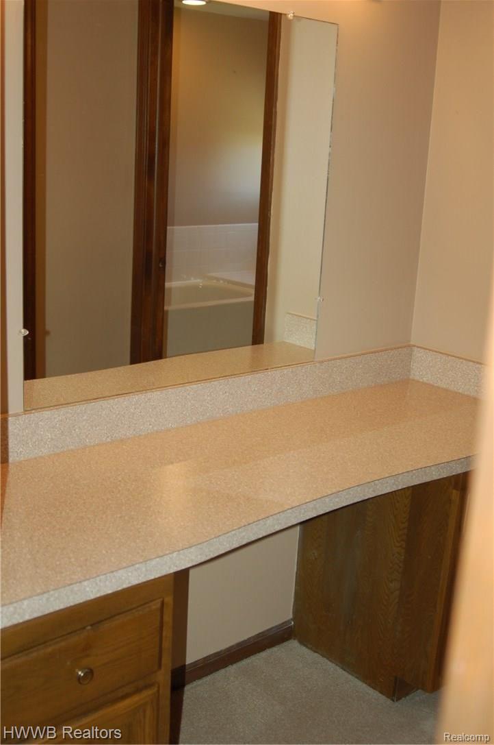 564 Sunlight Drive Rochester, MI 48309 - Photo 34 of 47 Vanity Area across from Walk-in Closet