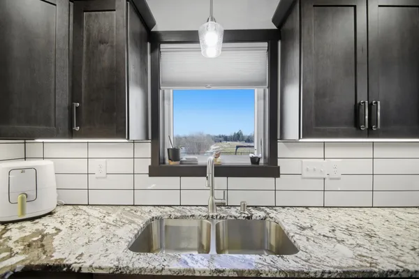 $409,000 | 1300 18th Drive Northeast, Austin, MN 55912