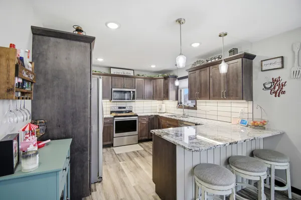 $419,000 | 1300 18th Drive Northeast, Austin, MN 55912