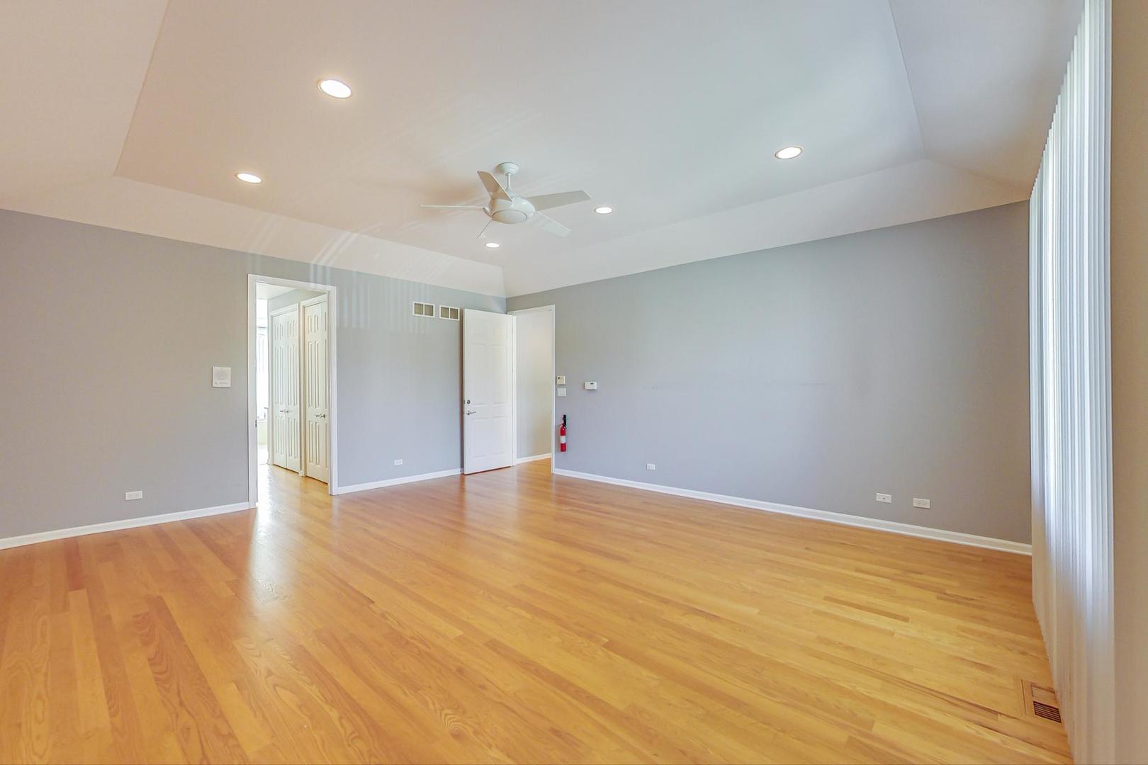 36 Riverside Drive Deerfield, IL 60015 - Photo 24 of 42 a view of an empty room with wooden floor