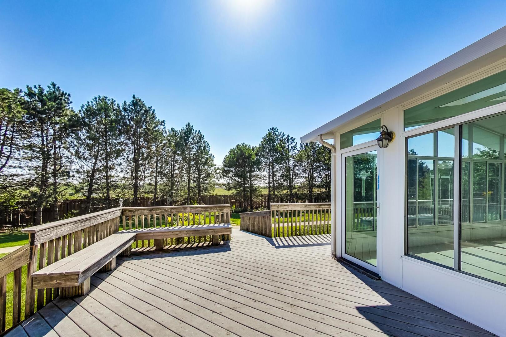 36 Riverside Drive Deerfield, IL 60015 - Photo 40 of 42 a view of a balcony with wooden floor