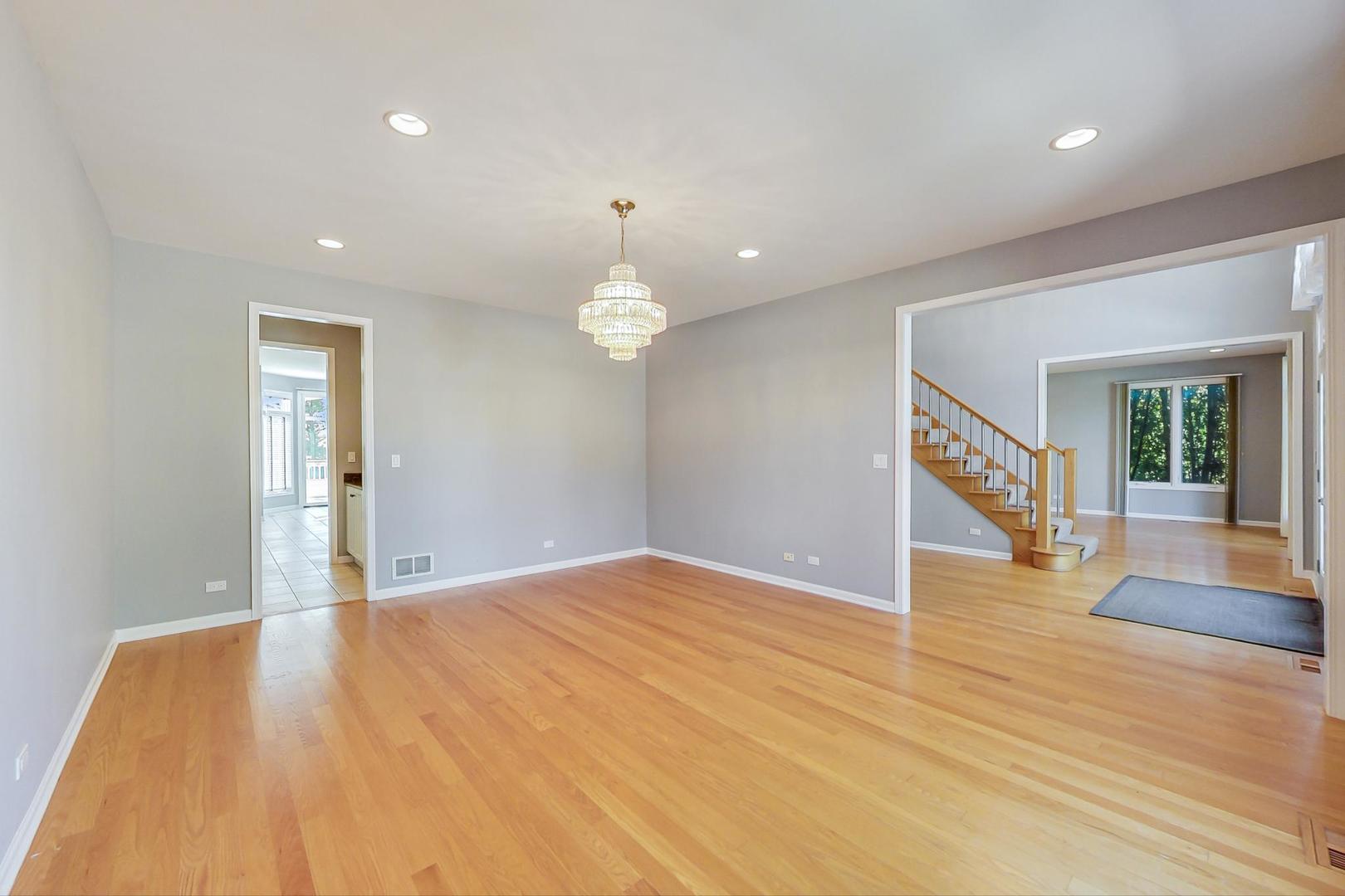 36 Riverside Drive Deerfield, IL 60015 - Photo 7 of 42 a view of empty room with wooden floor